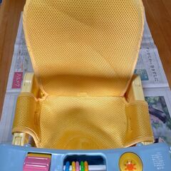 TOMY 　たためるバスチェアの画像