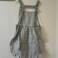 緑 エプロンの画像