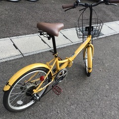 黄色折りたたみ中古自転車整備済自転車店の画像