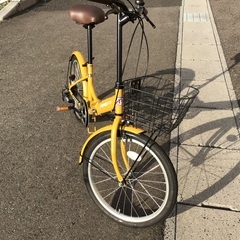 黄色折りたたみ中古自転車整備済自転車店の画像
