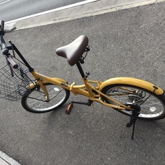 黄色折りたたみ中古自転車整備済自転車店の画像