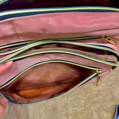 ショルダーバッグと水筒本日ホルダーの画像