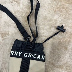 ショルダーバッグと水筒本日ホルダーの画像