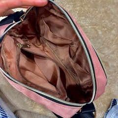 ショルダーバッグと水筒本日ホルダーの画像