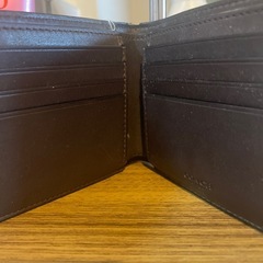 COACH 折りたたみ財布 の画像