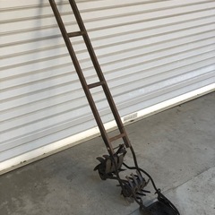 昔の田んぼ用草取り機の画像