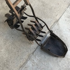 昔の田んぼ用草取り機の画像