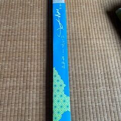 オレンジ色の物干しハンガー 室内干し 鴨居フックの画像