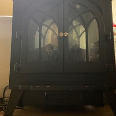 電気ストーブ型アンティークインテリアの画像