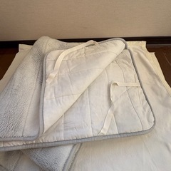 暖かい敷きパッドの画像
