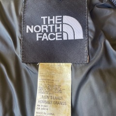 ノースフェイス ブルー ダウンジャケット中古品の画像