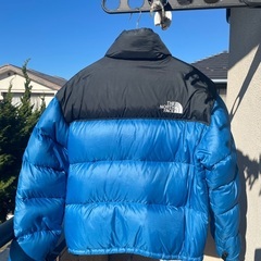 ノースフェイス ブルー ダウンジャケット中古品の画像