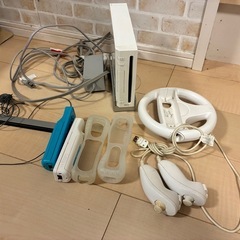 Wii本体とジャンクのコントローラーなど
の画像