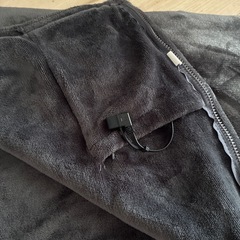 肩からかけれる電気毛布ジャンクの画像