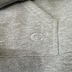 新品coach パーカーの画像