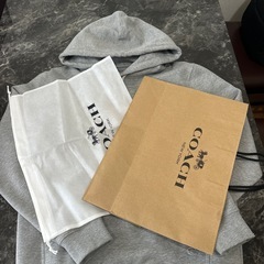 新品coach パーカーの画像