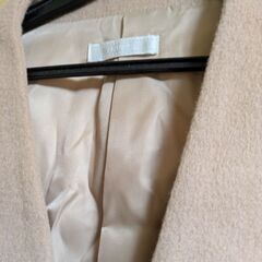 羊毛100%　ノーカラーベージュコート　トルディアの画像