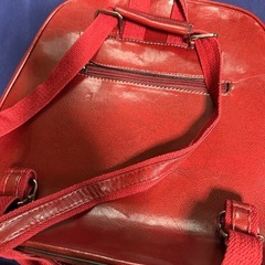 オシャレな赤いリュックの画像