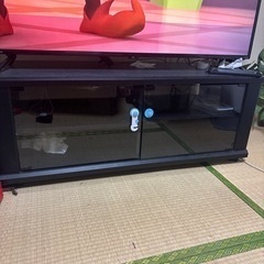 冷蔵庫・洗濯機・電子レンジ・棚の画像