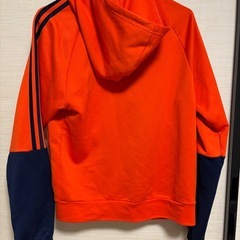adidas パーカー(オレンジ)の画像