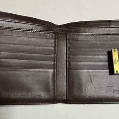 〈付属品全部あり〉GUCCIの二つ折り財布の画像