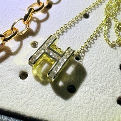 ゴールド 馬蹄 石付き アクセサリーの画像