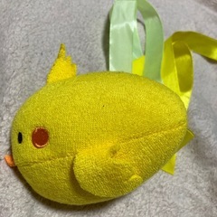 投げて遊ぶぬいぐるみの画像