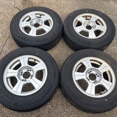 キューブ、スイフト 185/70R14 スタッドレスタイヤ アルミ付き4本セットの画像