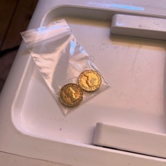 受け渡し予定者決まりました。小さな冷蔵庫と2ペンスコイン2枚の画像