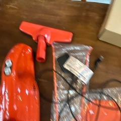 マキタコードレス掃除機　充電式　スタンド付　オレンジの画像