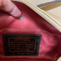 coach ゴールド　ハンドバッグ　ミニバッグの画像