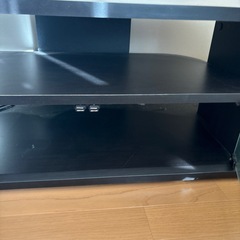 オーバル型テレビ台 黒　ガラス扉の引き出し付きの画像