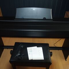 電子ピアノ及びピアノ専用椅子の画像