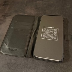【coach】iPhone15 Plus手帳型ケース　ブラック　シグネチャーの画像