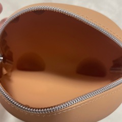 日焼けキティ ポーチの画像