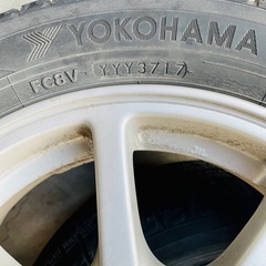 ダイハツ純製ホイール、スタッドレスタイヤ付き155/65r14の画像