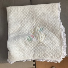 ロンパースとおくるみの画像