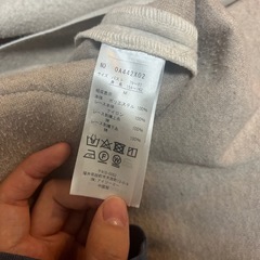 axes femme フード付きロングコートの画像