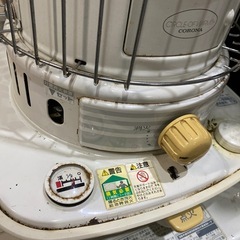 元気に営業中‼️ サビ・色褪せ有り　点火はマッチ又はチャッカマンで着けて下さい　コロナ丸型石油ストーブの画像