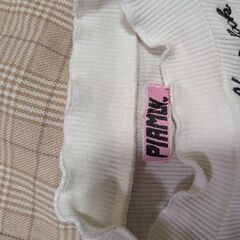 ベージュ系チェックのコットン混合ジャンパースカート、長袖トップス付き。の画像