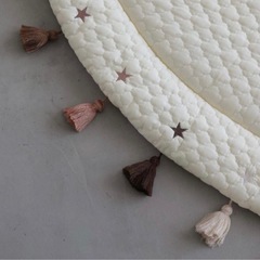 タッセル付き円形マットの画像