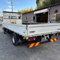 三菱ふそう　キャンター　積載４．５ｔ　ワイド超ロング平ボディの画像