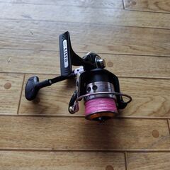 海釣り用竿とリールの画像