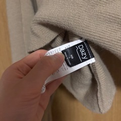 ベージュニットの画像