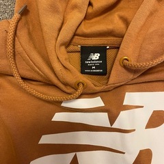 ニューバランスパーカーの画像