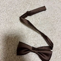 ブラウンの蝶ネクタイの画像