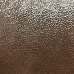 ダークブラウン レザーソファ モダンデザインの画像