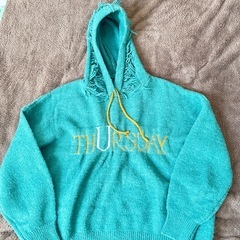 ニットパーカーの画像