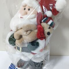 テディベアを抱いたサンタさんの画像