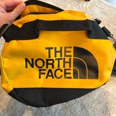 THE NORTH FACE ダッフルバッグ XS イエロー/ブラックの画像